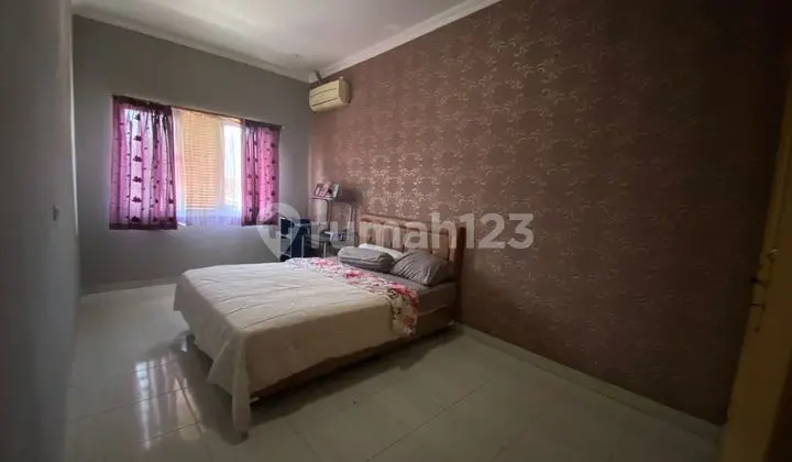 kamar tidur rumah homey dan asri 2