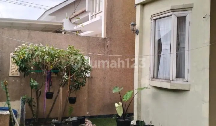 tampak depan rumah minimalis taman wisata regency