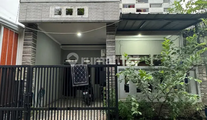 tampak depan rumah 2 lantai siap huni