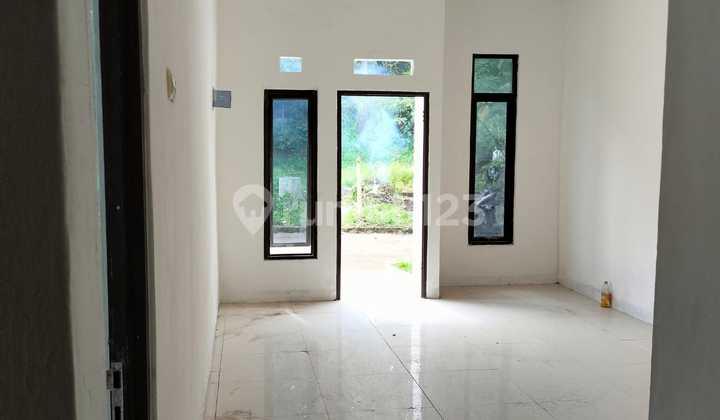 ruang tamu rumah turun harga di villa