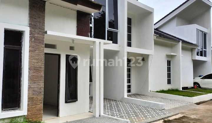 tampak depan rumah turun harga di villa