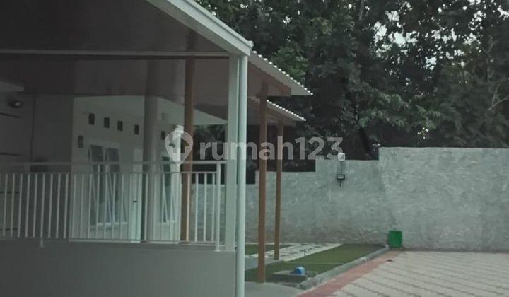 tampak depan rumah minimalis semi furnish lokasi