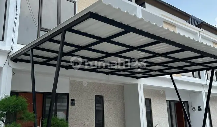 tampak depan cluster di dalam komplek iptn