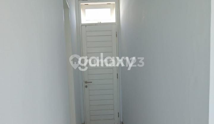 tampak depan rumah taman jimbaran badung, bali