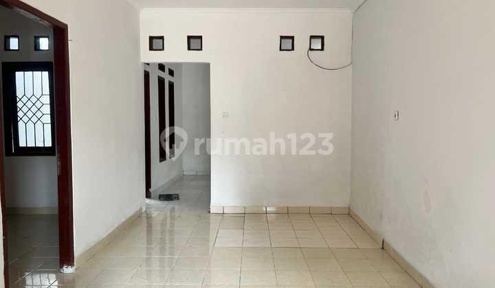 ruang keluarga rumah tamansari puri bali sawangan
