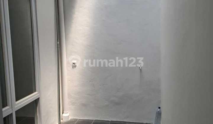 backyard rumah rapih siap huni di