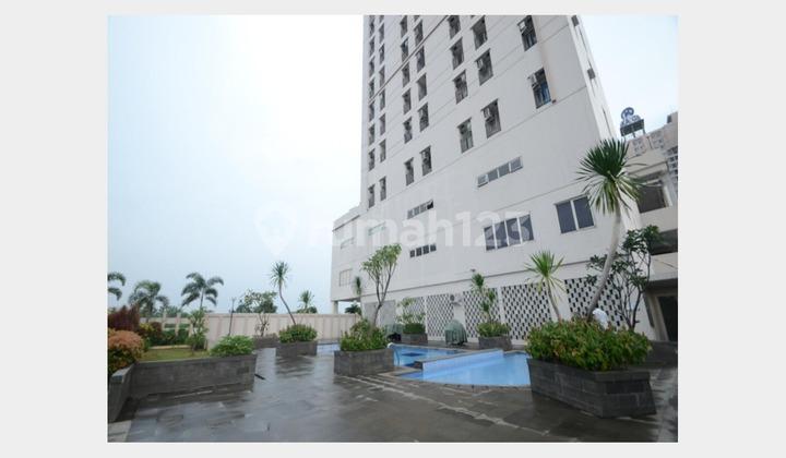 tampak depan apartemen strategis beji depok, murah