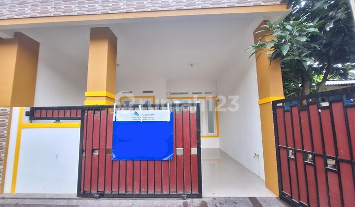 tampak depan dijual rumah murah dekat krl