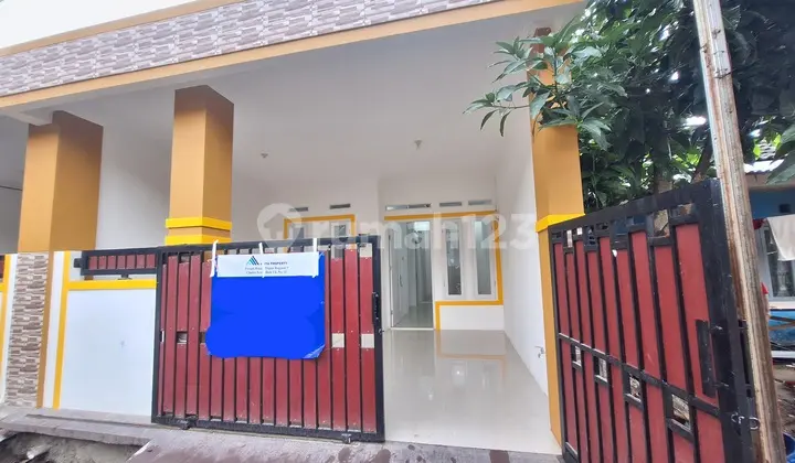 tampak depan dijual rumah di alam pesona