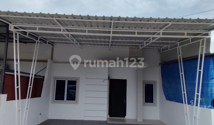 tampak depan dijual rumah siap huni dan