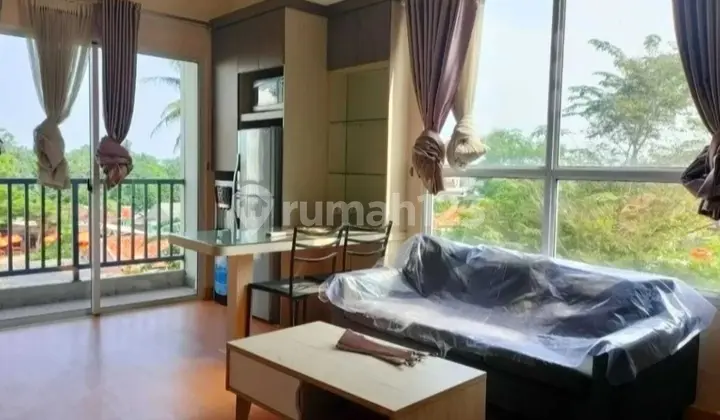 ruang tamu apartemen saveria, 2br - full