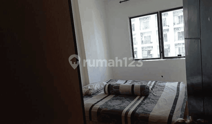 kamar tidur apartemen cosmo residence thamrin city