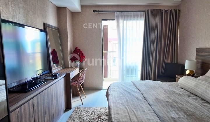 tampak depan apartemen type studio full furnish