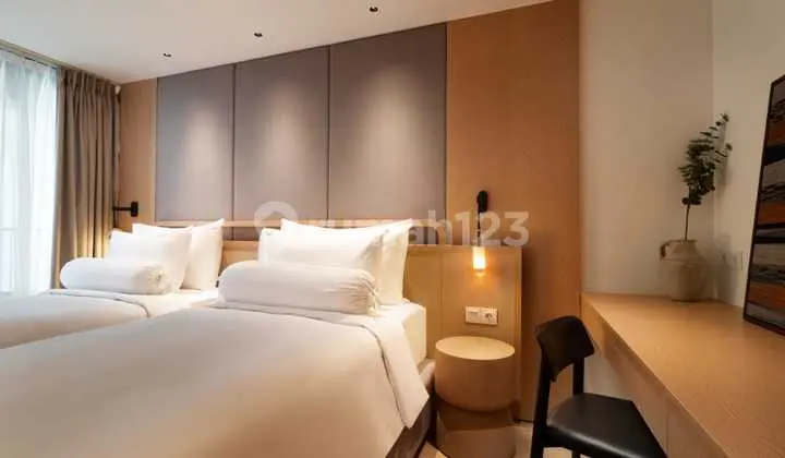 kamar tidur apartemen strategis view laut dan