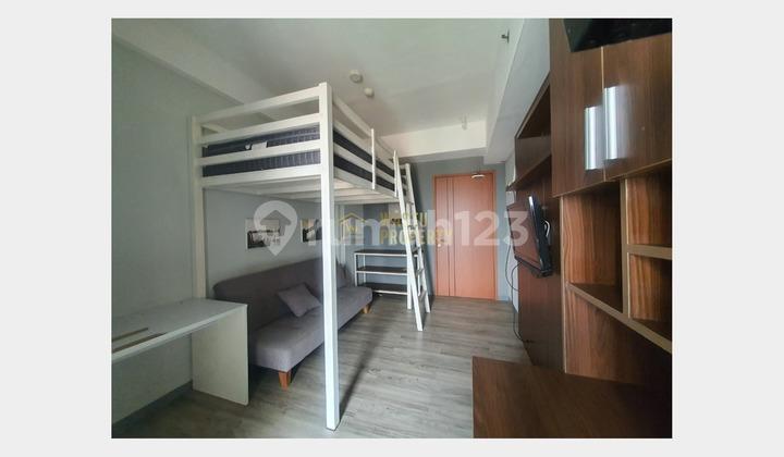 tampak depan apartemen tipe studio strategis dekat