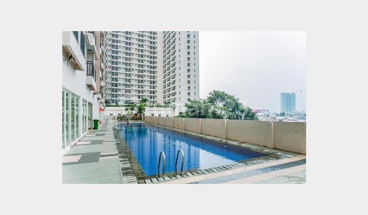 tampak depan studio apartemen murah dekat kawasan