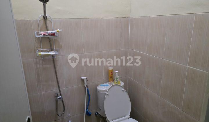 kamar mandi rumah dengan posisi hoek dan