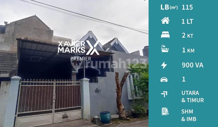 tampak depan rumah murah di perumahan graha