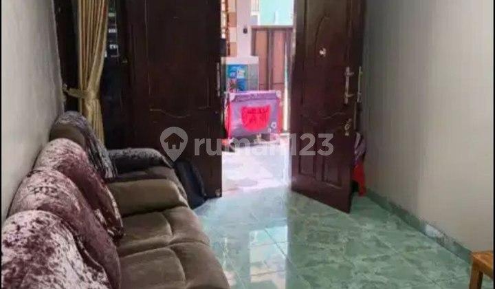 ruang tamu rumah 2 lantai pondok pekayon