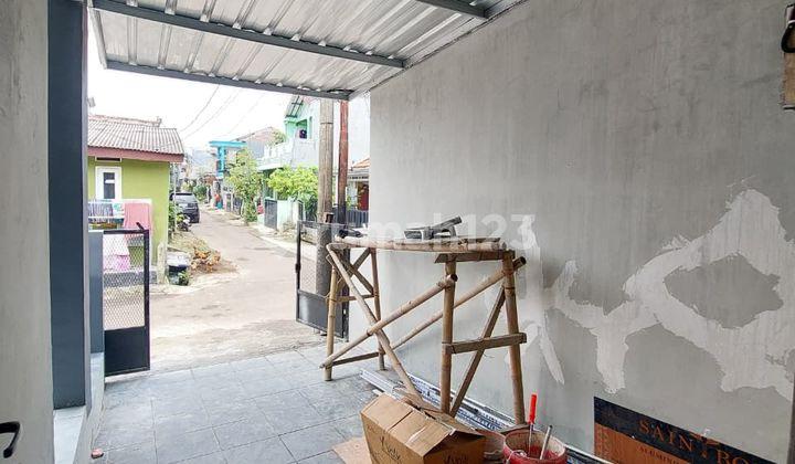 garasi/carport dijual rumah baru renovasi di