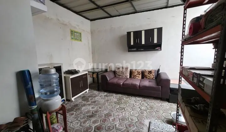 ruang tamu rumah siap huni di cluster