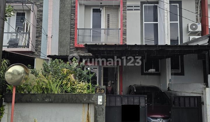 tampak depan dijual rumah 2 lantai boulevard