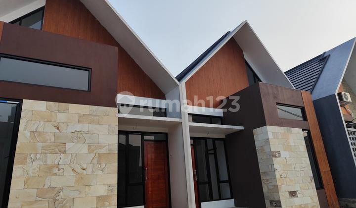 tampak depan rumah cantik scandinavian akses stasiun