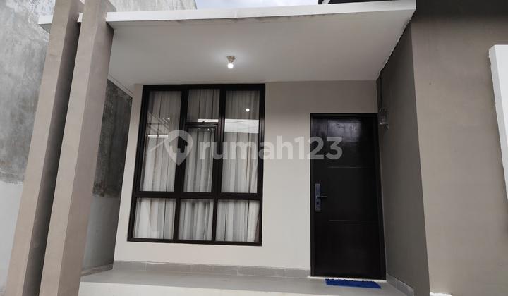 tampak depan rumah cantik siap huni kawasan