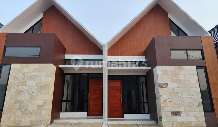 tampak depan rumah cantik scandinavian akses stasiun