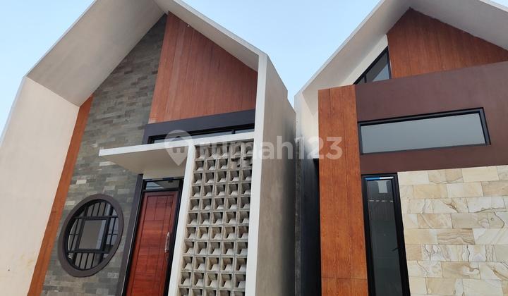 tampak depan rumah cantik scandinavian akses stasiun