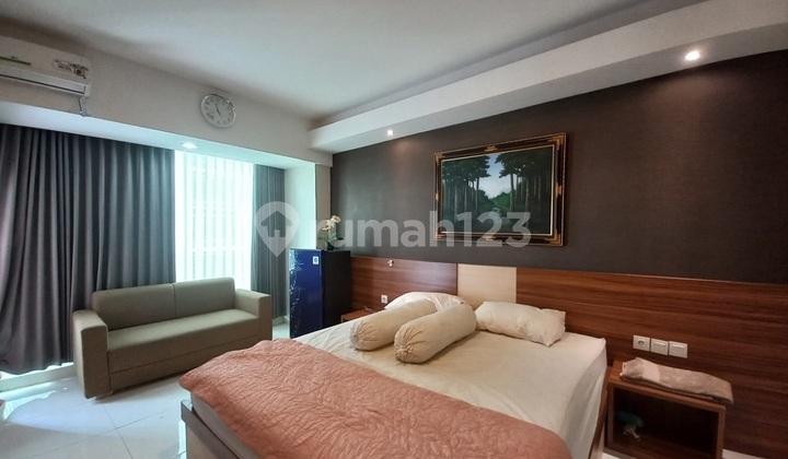 kamar tidur unit apartemen mataram city lantai
