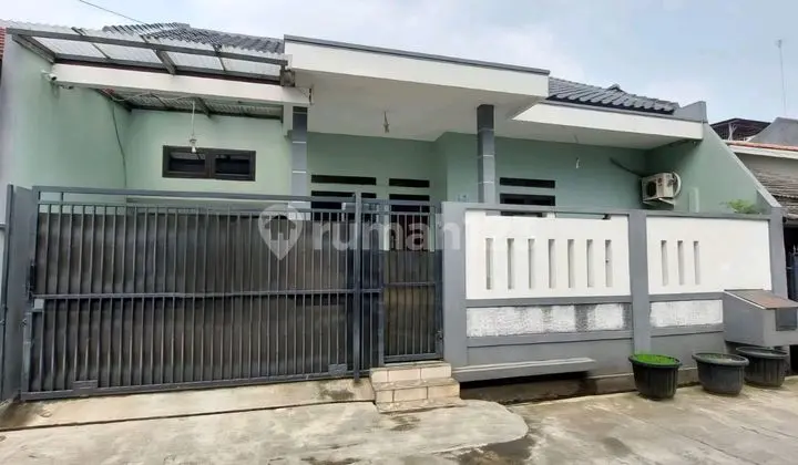 tampak depan rumah siap huni dijual di