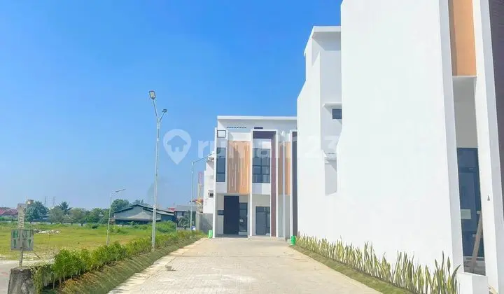 tampak depan villa green park cluster orchid