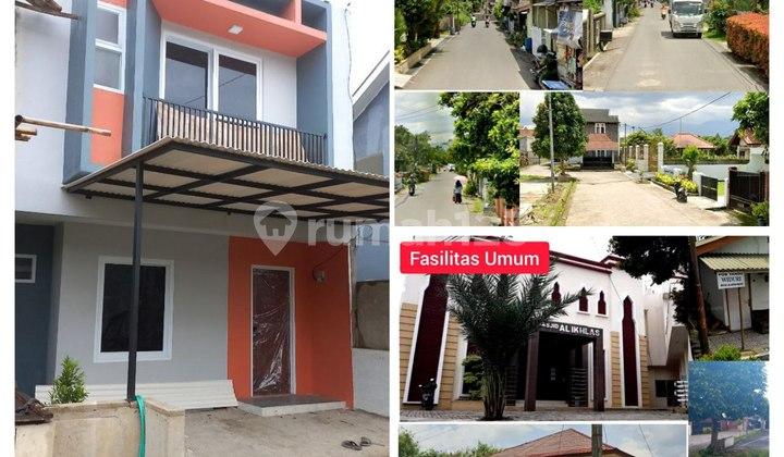 tampak depan rumah 2 lantai baru di