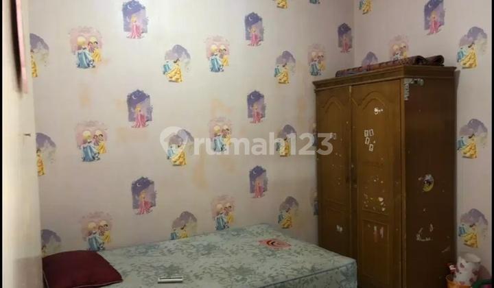 kamar tidur rumah taman ubud kencana lippo