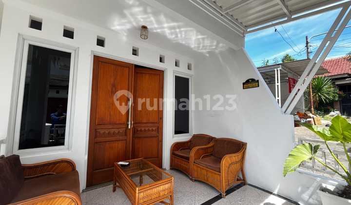 tampak depan rumah semi villa 2lantai di