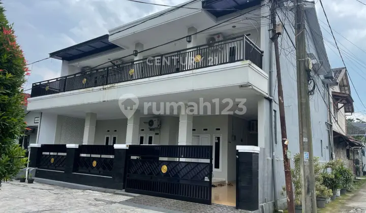 tampak depan rumah hoek siap huni di