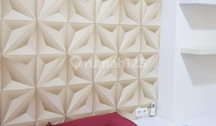 tampak depan apartemen type studio full interior