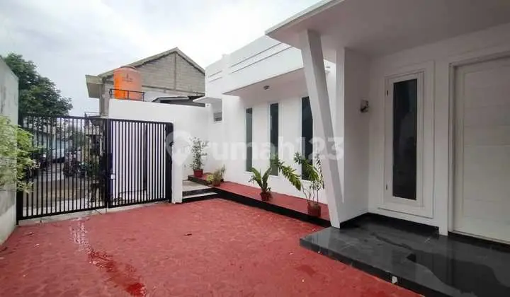 tampak depan rmh asri villa pertiwi lt.211m²