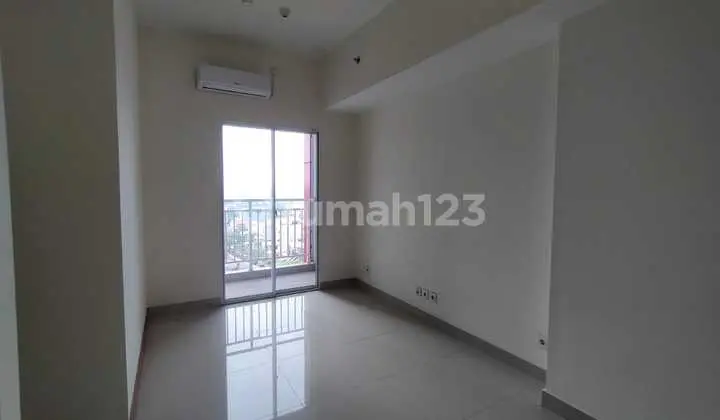 ruang keluarga apartemen grand taman melati margonda