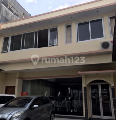 CHEAP. NEGOTIABLE. Near Pasar Baru. On Asia Africa Main Road. Business premises plus residence.