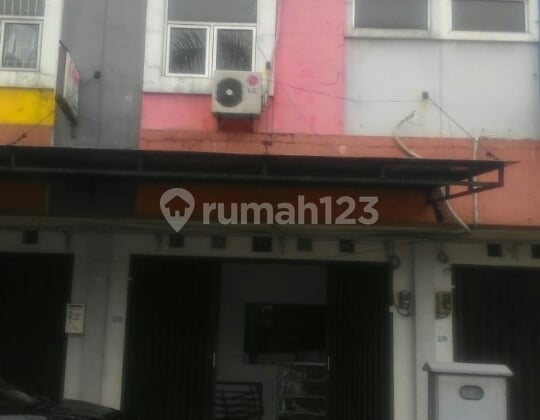 Shop houses in a bustling area