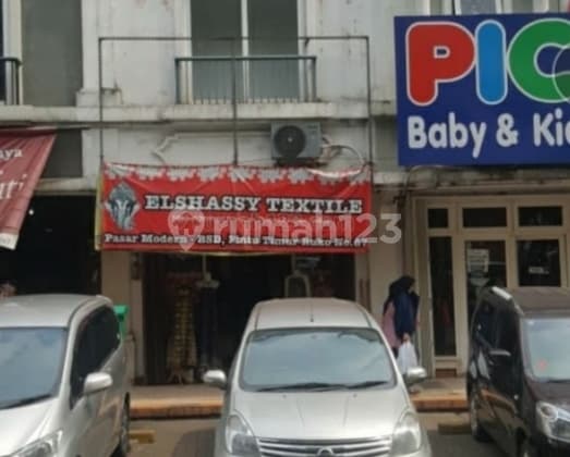 Ruko pasar modern menghadap jalan besar