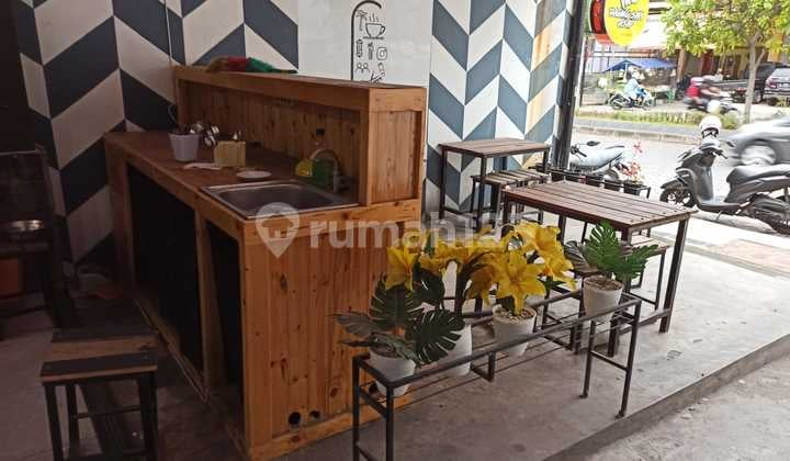 Two-story shop house, Land Area 90 m2, Building Area 180 m2, on Jl Kalimantan GKB Gresik.