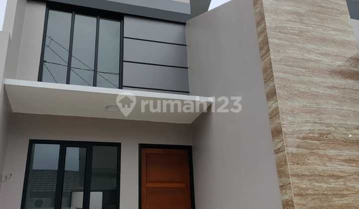Rumah exclusive di Renijaya Pondok petir Depok