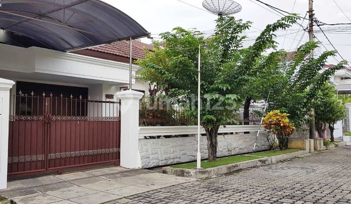 House in North Dharmahusada, Nice + Well-Maintained, Street row can fit 6 - 7 cars.