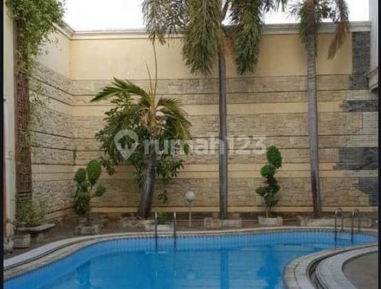 KOMERSIAL RAYA DARMO 959M2 RUMAH PLUS KOLAM RENANG PRIBADI