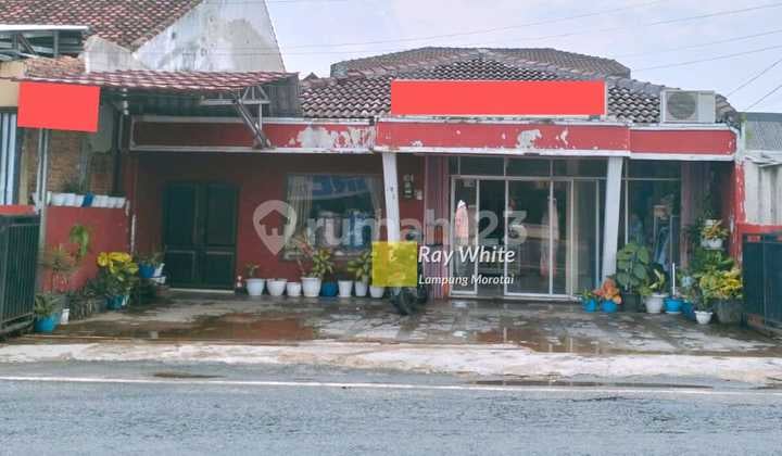 RUMAH PINGGIR JALAN PENGAJARAN