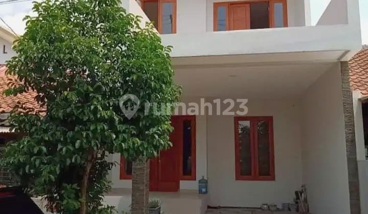 Rumah Babatan Pratama Wiyung Model Minimalis Depan Fasum