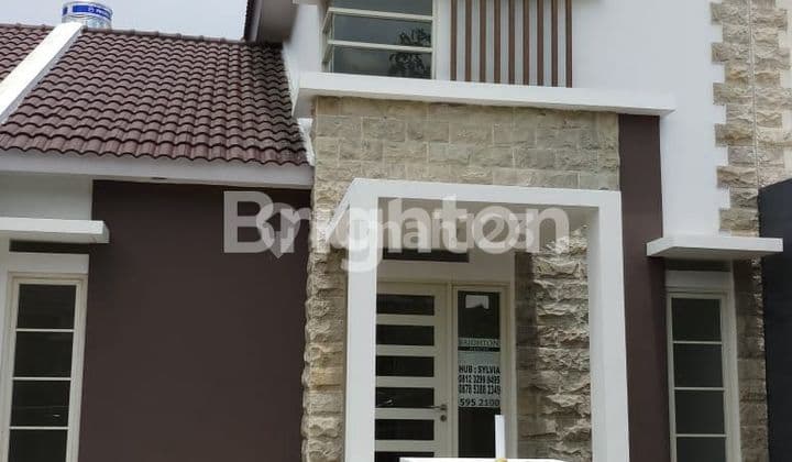 RUMAH 700 JT AN DI PURI SURYA JAYA CLUSTER VALENCIA DEKAT KE TOL WARU DAN TOL JUANDA